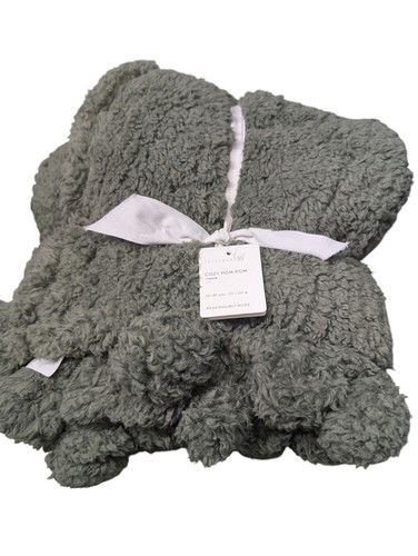 New crate barrel cozy pom - new,